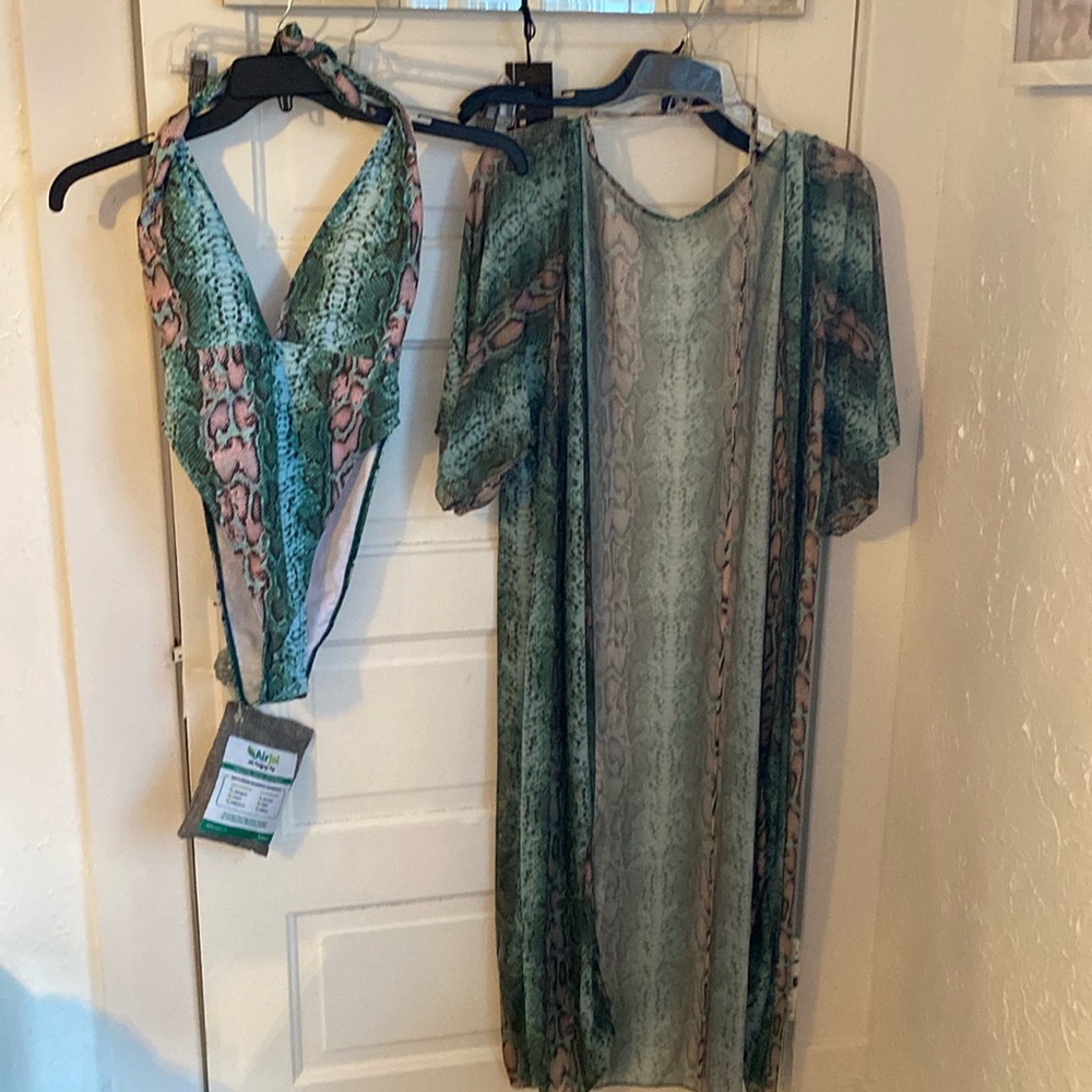 Two-piece, bathing suit with the one piece and then the cover-up